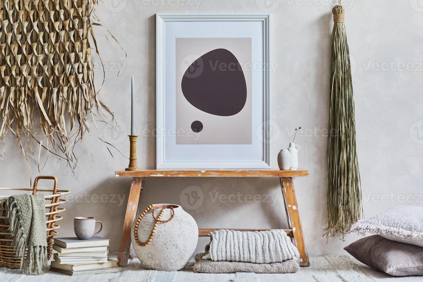 Stylish composition of cozy living room interior with mock up poster frame, bench in retro style, clay vases, crockery and straw decoration. Rustic inspiration. Template. photo