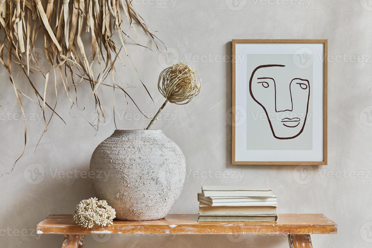 Stylish composition of cozy living room interior with mock up poster frame, bench in retro style, clay vases, crockery and straw decoration. Rustic inspiration. Summer vibes. photo