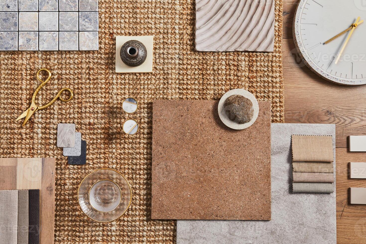 Flat lay of creative architect moodboard composition with samples of building, orange textile and natural materials and personal accessories. Top view, template. photo