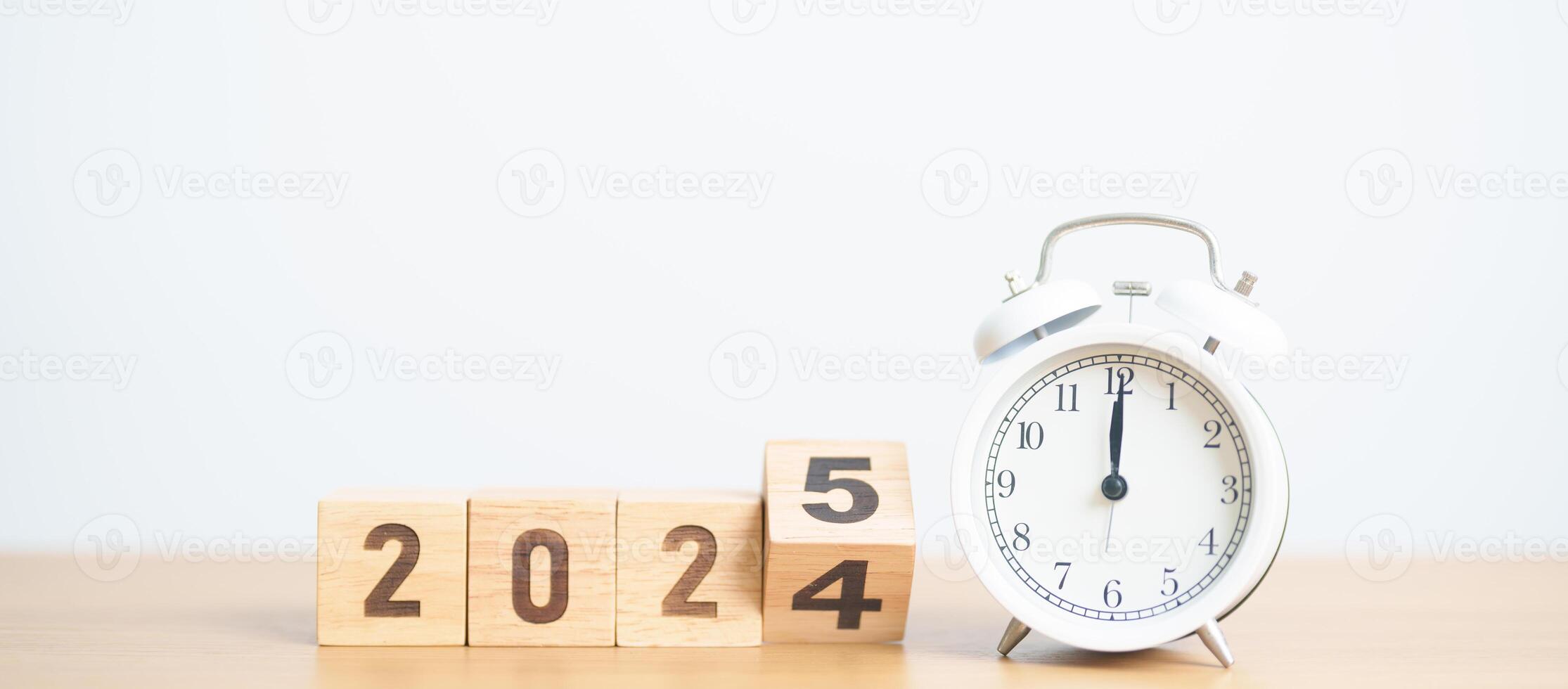 2024 end year to Happy New Year 2025 with vintage alarm clock. Christmas, New Start, Resolution, countdown, Goals, Plan, Action and Motivation Concept photo