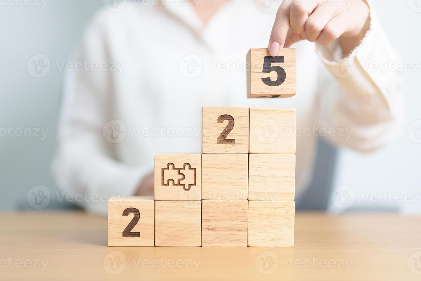 2025 year block with jigsaw puzzle icon. Business Process, Team, teamwork, Goal, mission, Resolution, strategy, plan, Action, partnership, and New Year start photo