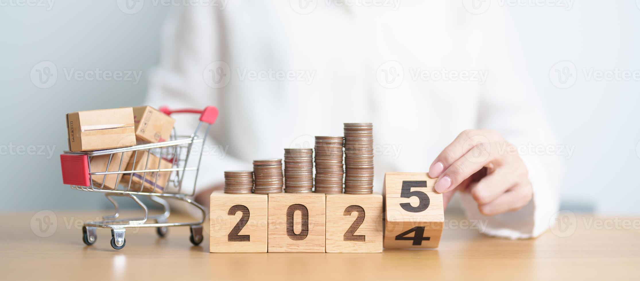 2024 end year to Happy New Year 2025 with shopping cart and money coins stack. online shopping, Marketplace platform website, technology, ecommerce, shipping delivery, logistics and online payment photo