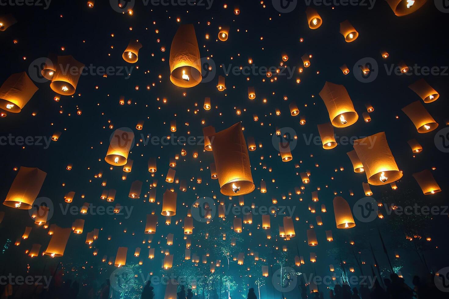 Hundreds of lanterns floating in the night sky creating a magical atmosphere photo