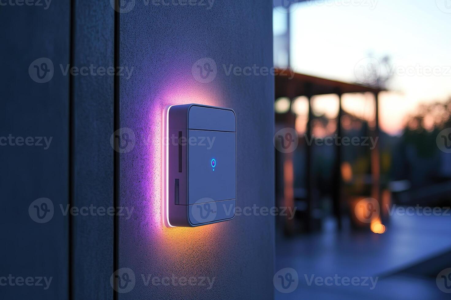 Modern smart light switch mounted on a concrete wall glowing in the evening photo
