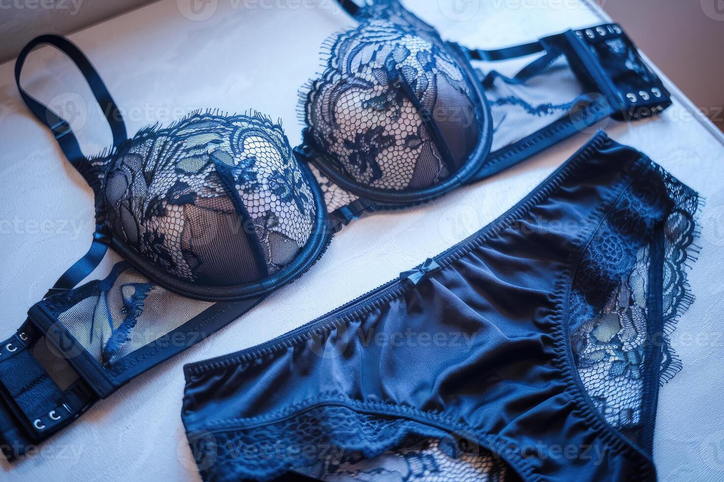 Elegant blue lingerie set displayed on white background photo