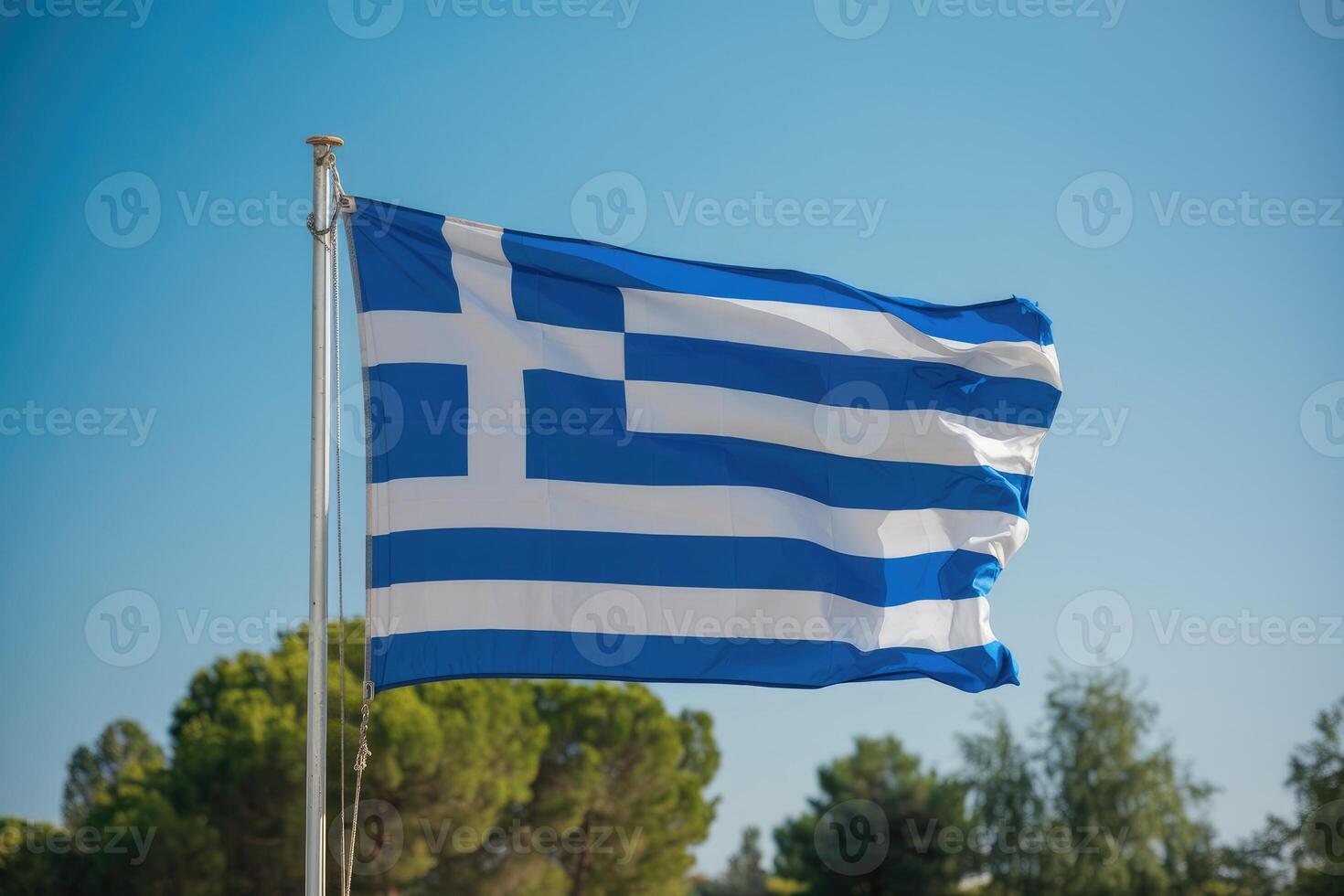 Greek flag waving in the wind on a sunny day photo