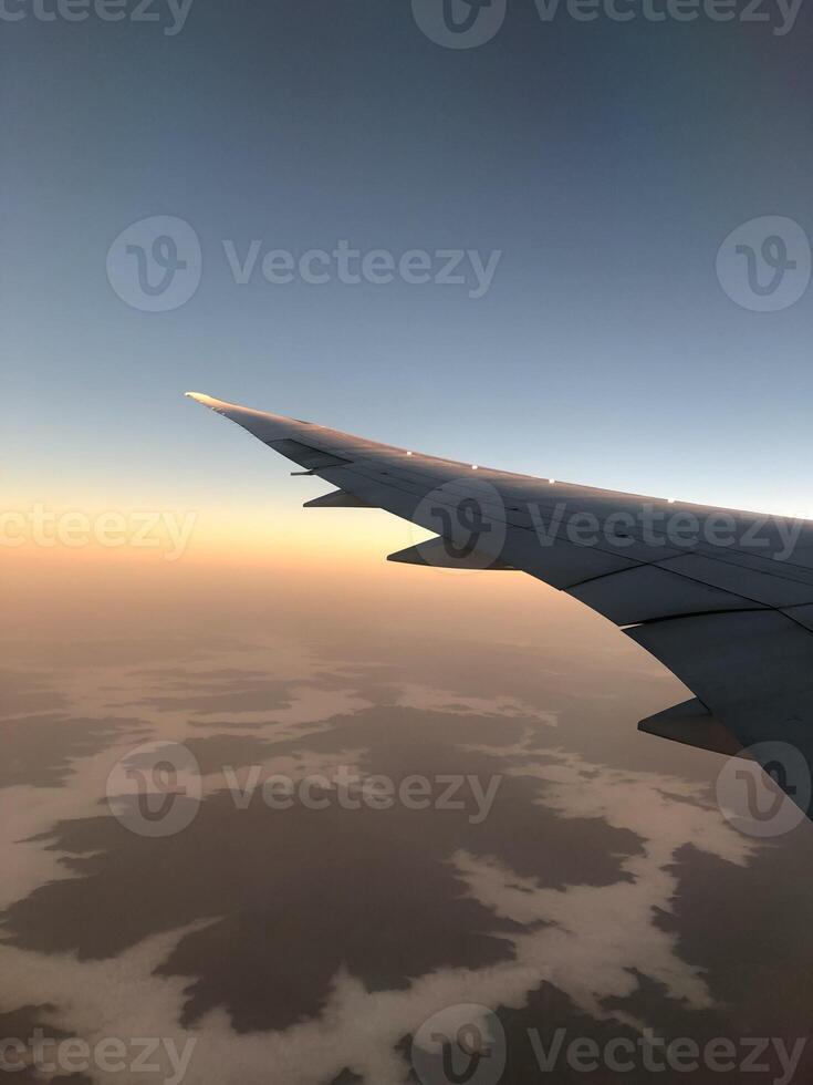 view from an airplane window. Clouds. Wing photo