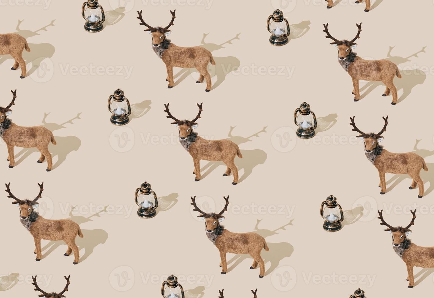Trendy Christmas pattern made with brown reindeer and vintage lantern on pastel cream background. Minimal creative Christmas and New Year concept. Festive holiday pattern backdrop. Xmas aesthetic. photo