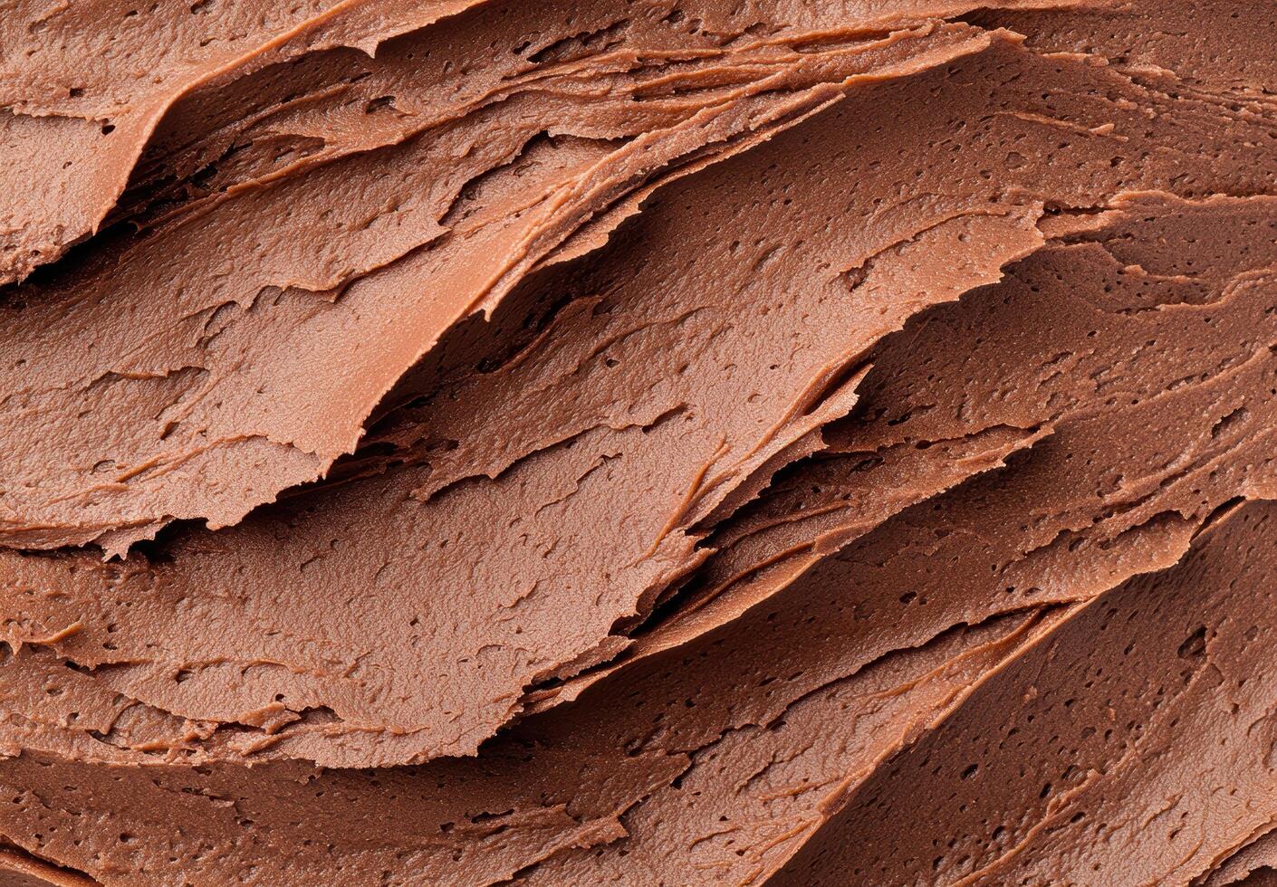 Smooth chocolate frosting texture photo