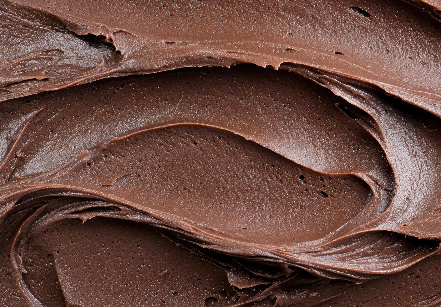 Close up view of rich, creamy chocolate photo