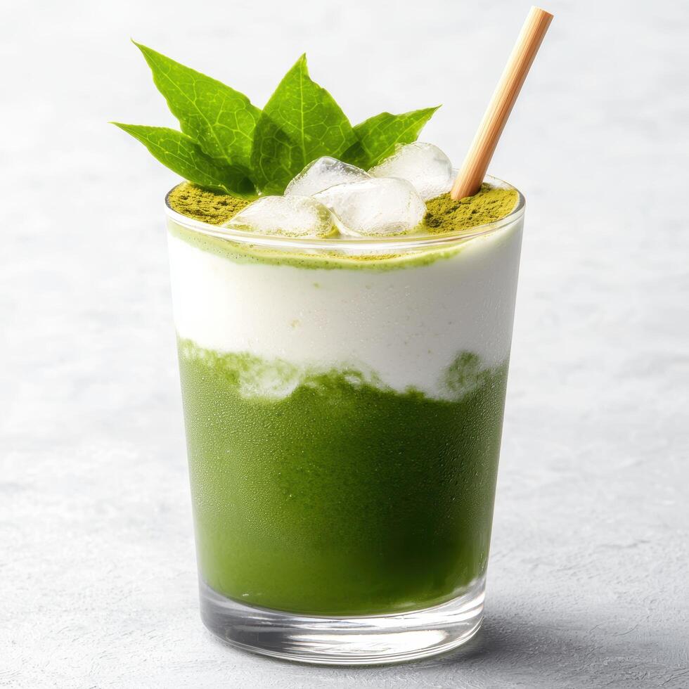 Refreshing green matcha tea drink with ice and mint photo