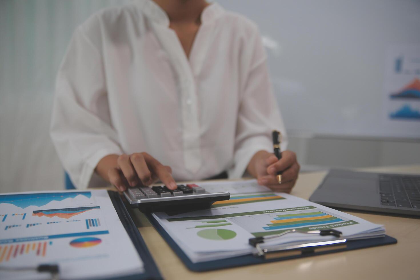 Business Documents, Auditor businesswoman checking searching document legal prepare paperwork or report for analysis TAX time,accountant Documents data contract partner deal in workplace office photo