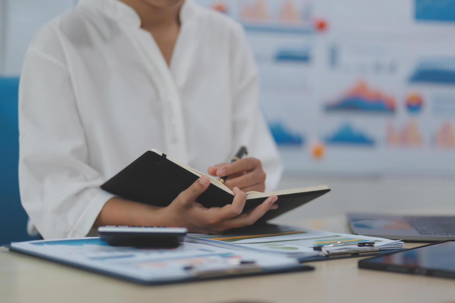 Business Documents, Auditor businesswoman checking searching document legal prepare paperwork or report for analysis TAX time,accountant Documents data contract partner deal in workplace office photo