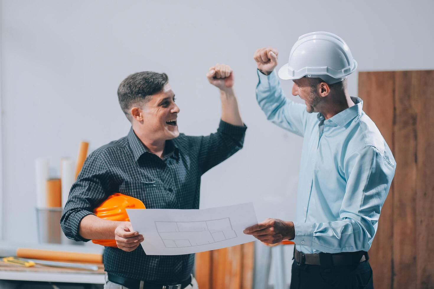 Team Engineers with draft plan of building on constructing site. Engineer work on site. engineer visit and inspection site engineer. Inspector engineer check and working on site. photo