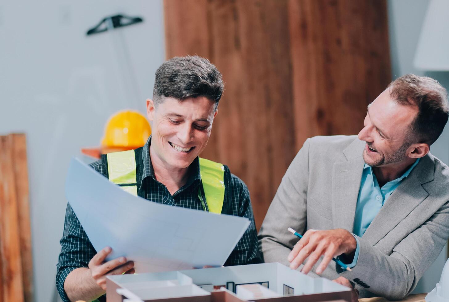 Team Engineers with draft plan of building on constructing site. Engineer work on site. engineer visit and inspection site engineer. Inspector engineer check and working on site. photo