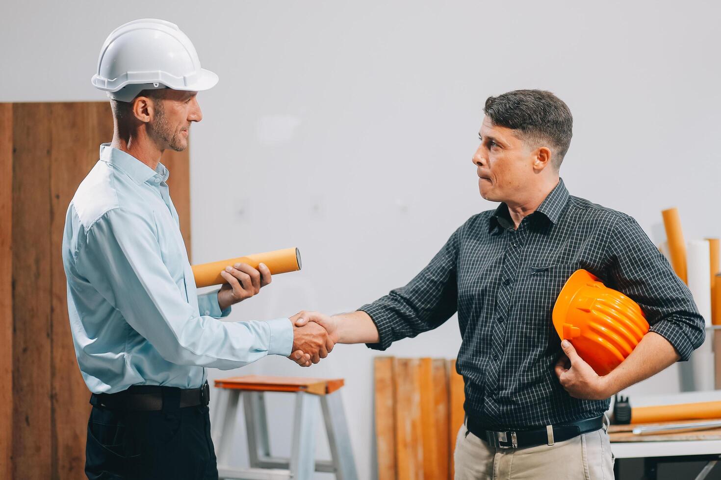 Team Engineers with draft plan of building on constructing site. Engineer work on site. engineer visit and inspection site engineer. Inspector engineer check and working on site. photo