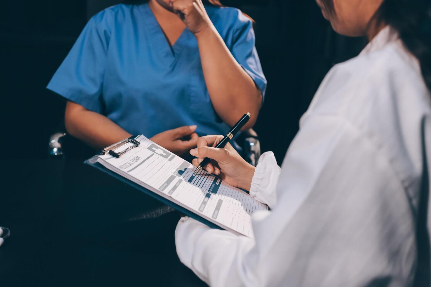 Clinic, tablet and hands of doctor with patient for consulting, medical service and help in hospital. Healthcare, telehealth and people on digital tech for diagnosis, online results and insurance photo
