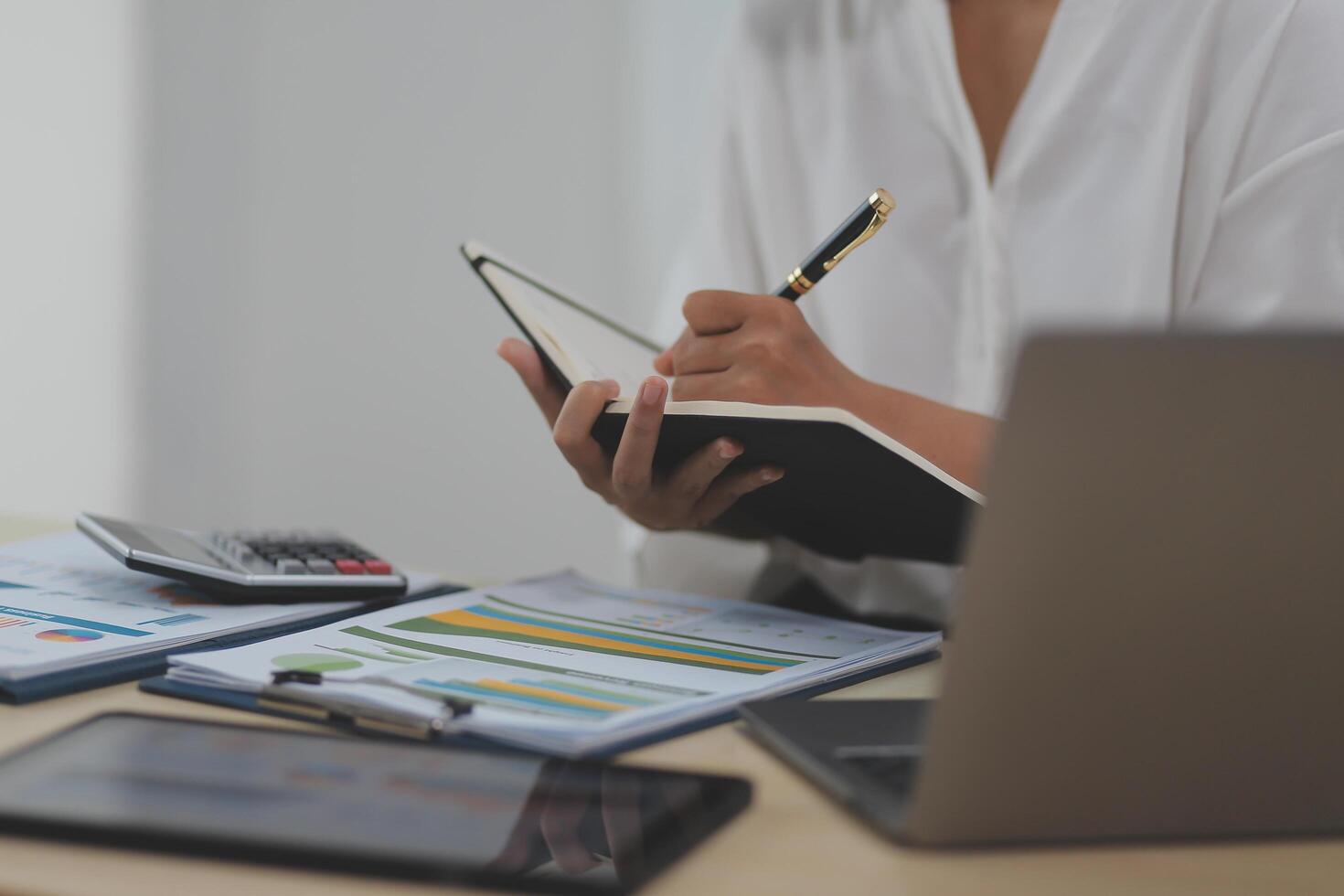 Business Documents, Auditor businesswoman checking searching document legal prepare paperwork or report for analysis TAX time,accountant Documents data contract partner deal in workplace office photo