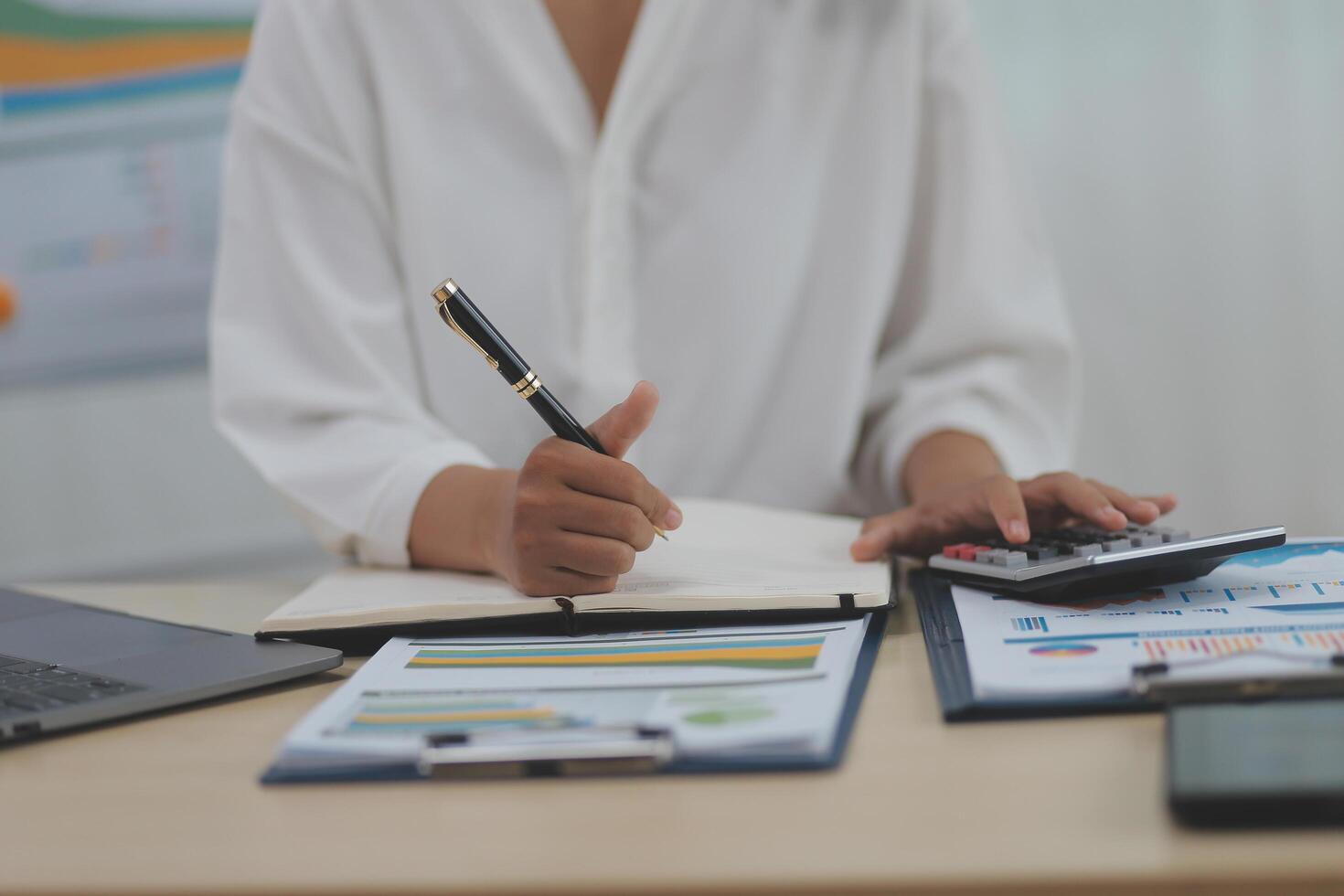 Business Documents, Auditor businesswoman checking searching document legal prepare paperwork or report for analysis TAX time,accountant Documents data contract partner deal in workplace office photo