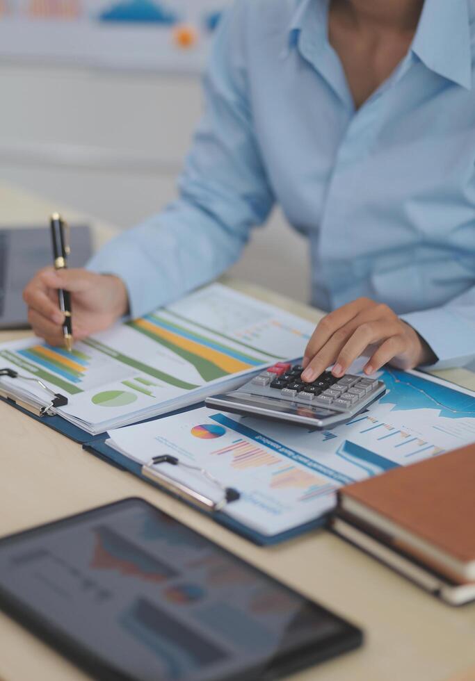 Business Documents, Auditor businesswoman checking searching document legal prepare paperwork or report for analysis TAX time,accountant Documents data contract partner deal in workplace office photo