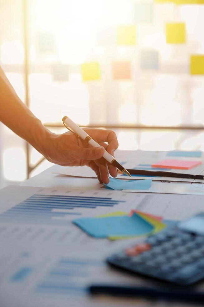 businessman working data document graph chart report marketing research development planning management strategy analysis financial accounting. Business office concept. photo