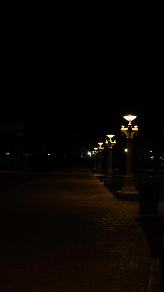 A street light is on photo