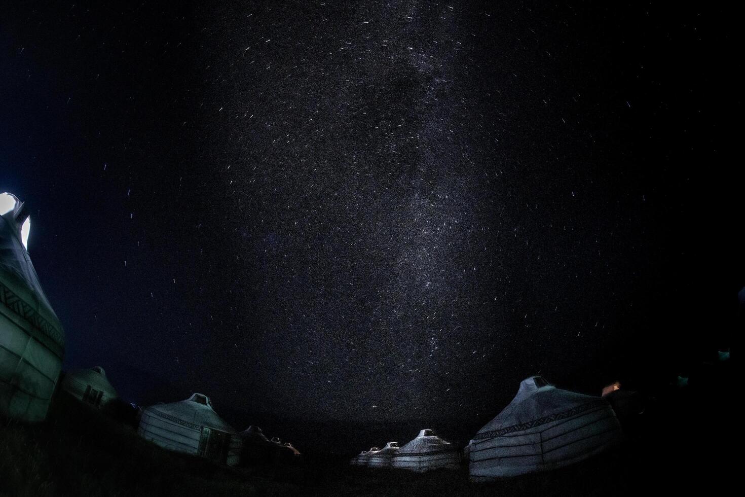 Night sky with stars field and Milky Way over the Gers camping in Mongolia photo