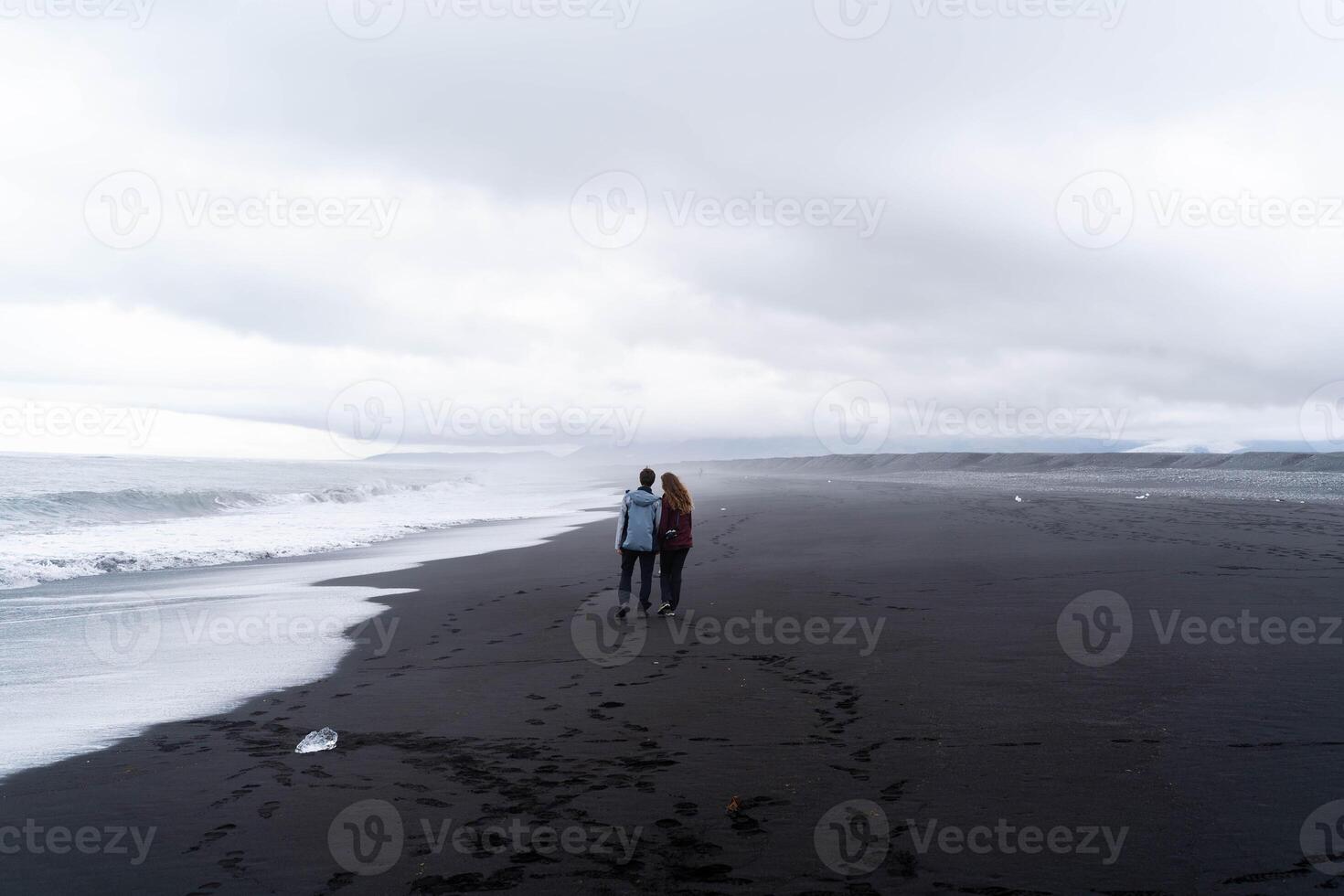 Spending time together on the beach near the ocean photo
