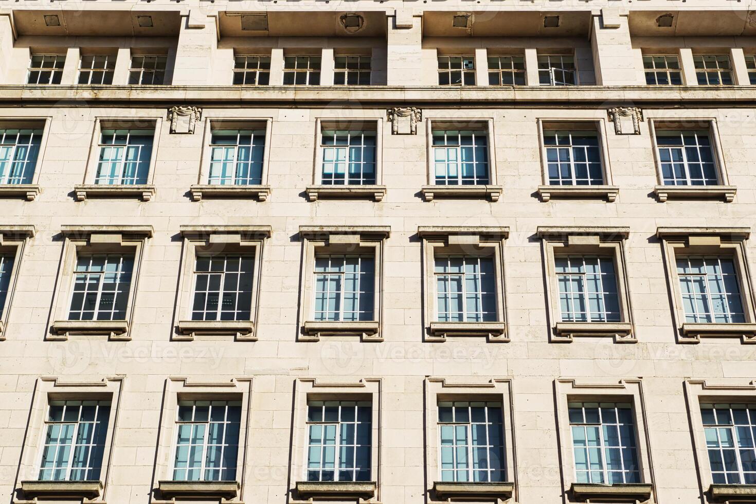 Building Facade with Grid of Windows photo