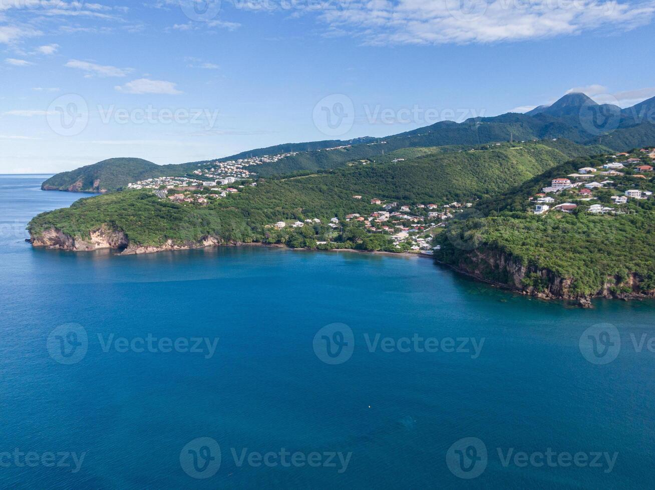 Drone view of the coast near Case-Pilote with the mountains in the background, Martinique, West Indies, France photo