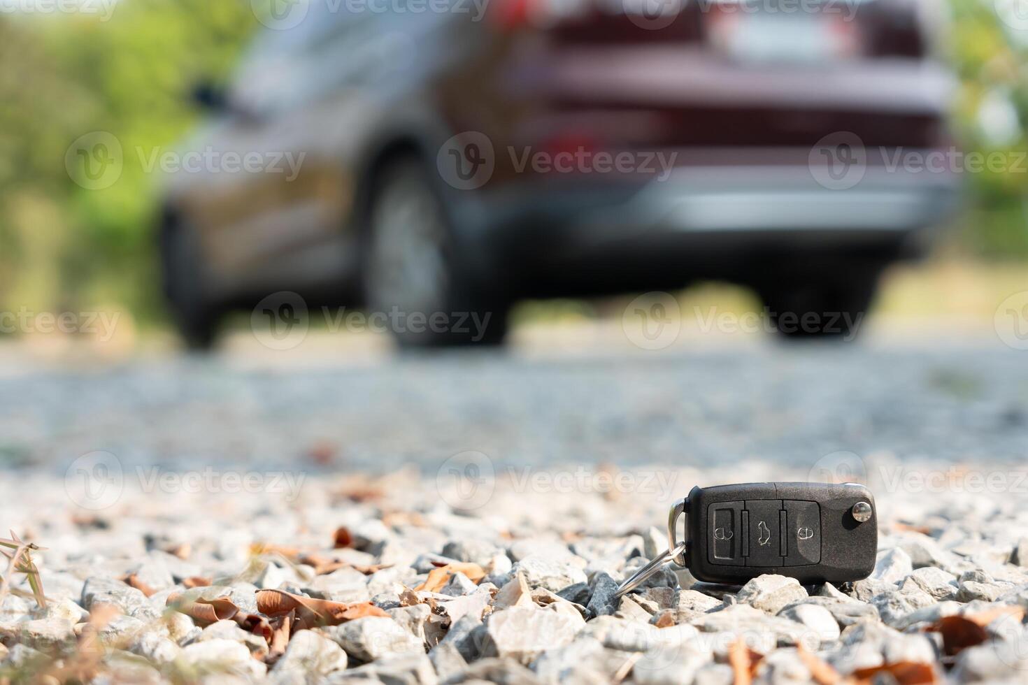 Lost car keys on the ground, Car keys dropped on the floor or fall lying on the street home front. Walking Away From Lost Car Key, can not transport, express, rush time, wast time, emergency photo