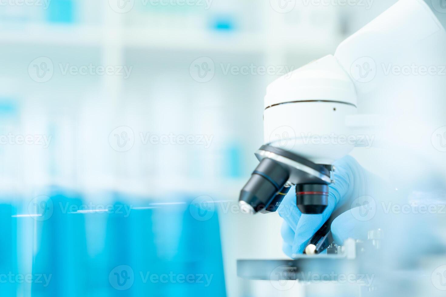 Scientist analyze biochemical samples in advanced scientific laboratory. Medical professional use microscope look microbiological developmental of viral. Biotechnology research in science lab. photo