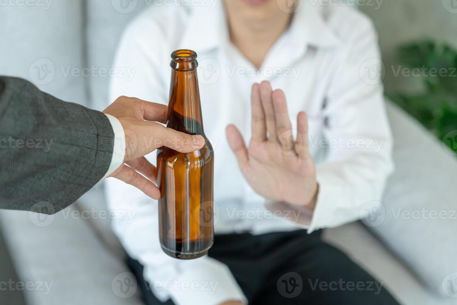 man refuses say no and avoid to drink an alcohol whiskey, stopping hand sign male, alcoholism treatment, alcohol addiction, quit booze, Stop Drinking Alcohol. Refuse Glass liquor, unhealthy, reject photo