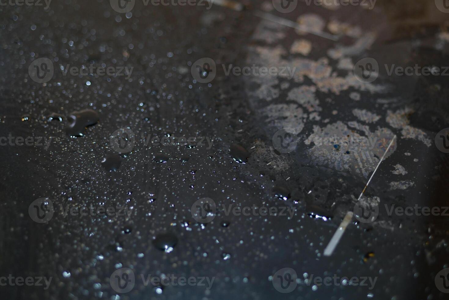 A black dirty electric stove. closeup . photo