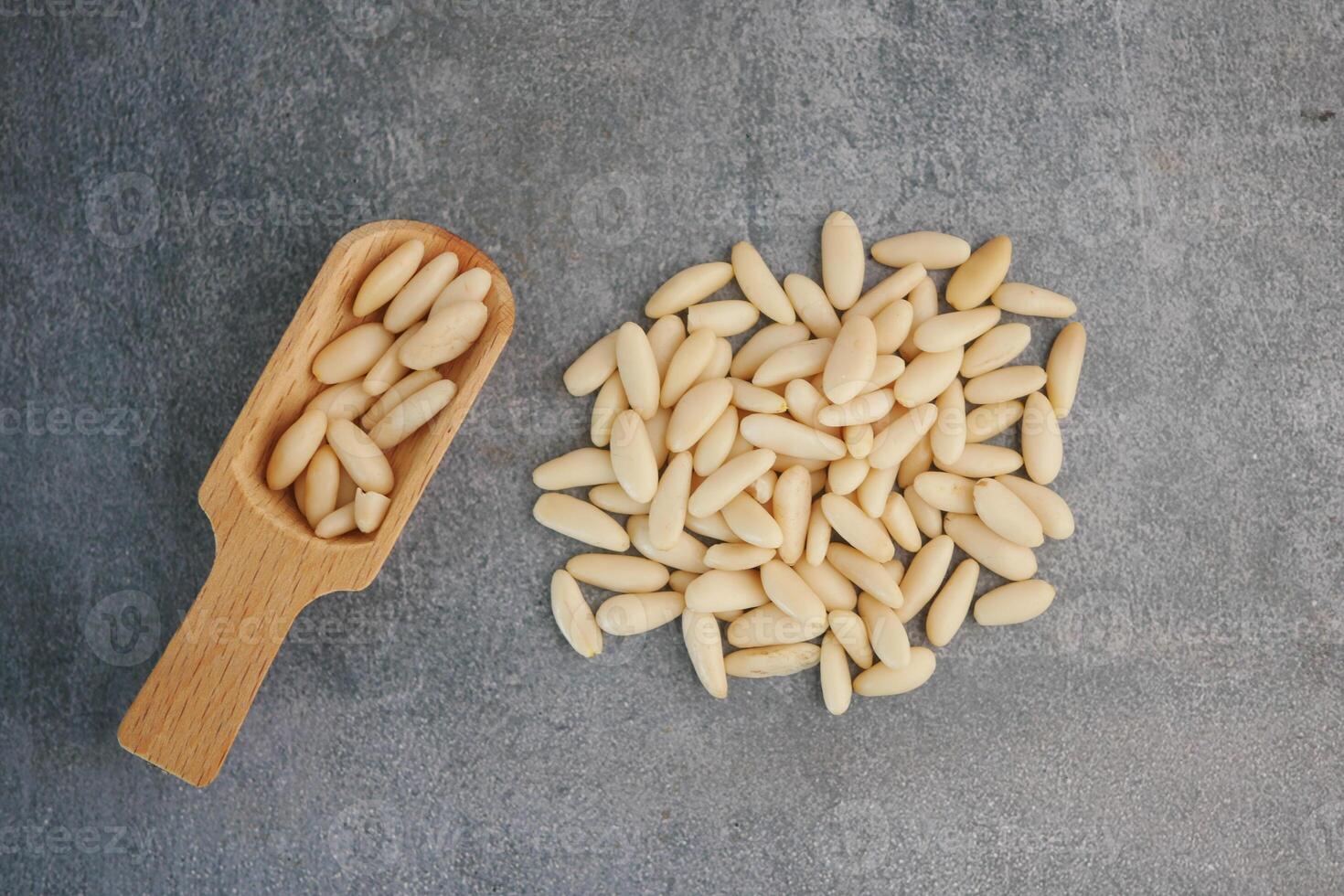 Healthy pine nuts isolated on white background. photo