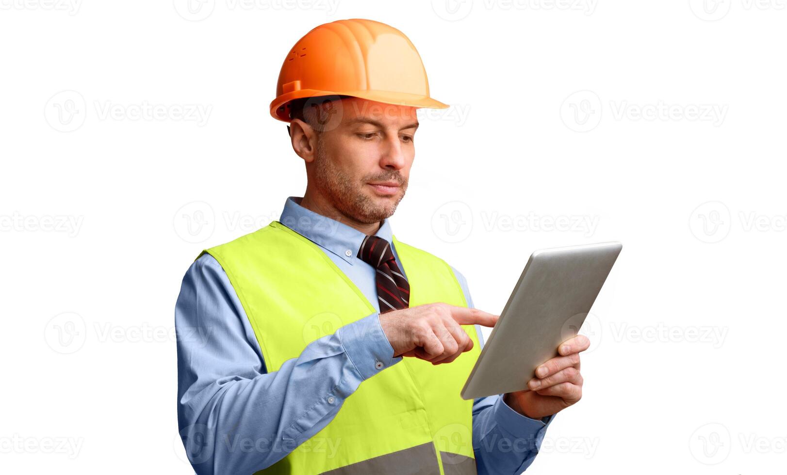 Building Engineer Using Digital Tablet Working Online Standing Over White Studio Background. Industrial Building Engineering, Builder Using Computer Browsing Internet Concept photo