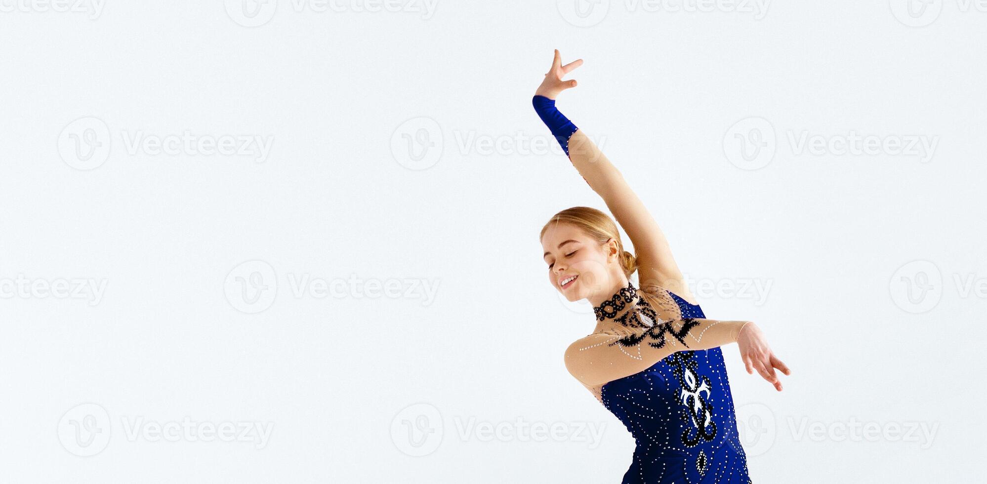 Smiling dancer or professional gymnast in beautiful red leotard on white background, panorama with blank space photo