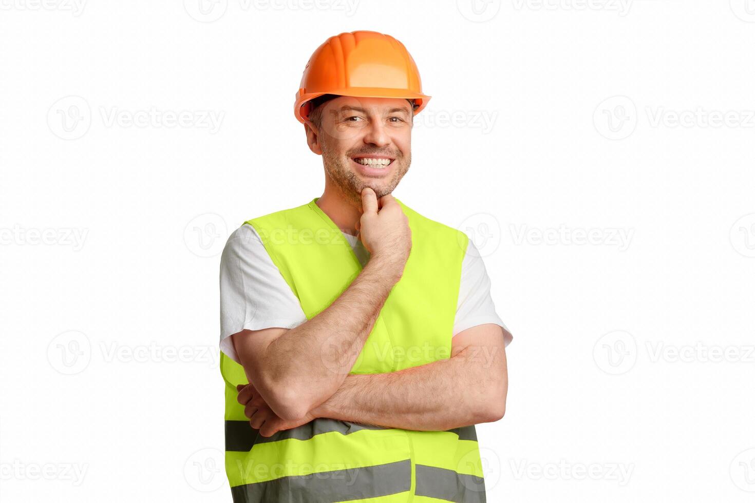 Construction Worker. Happy Builder Workman Smiling To Camera Posing Standing On White Studio Background. Copy Space photo