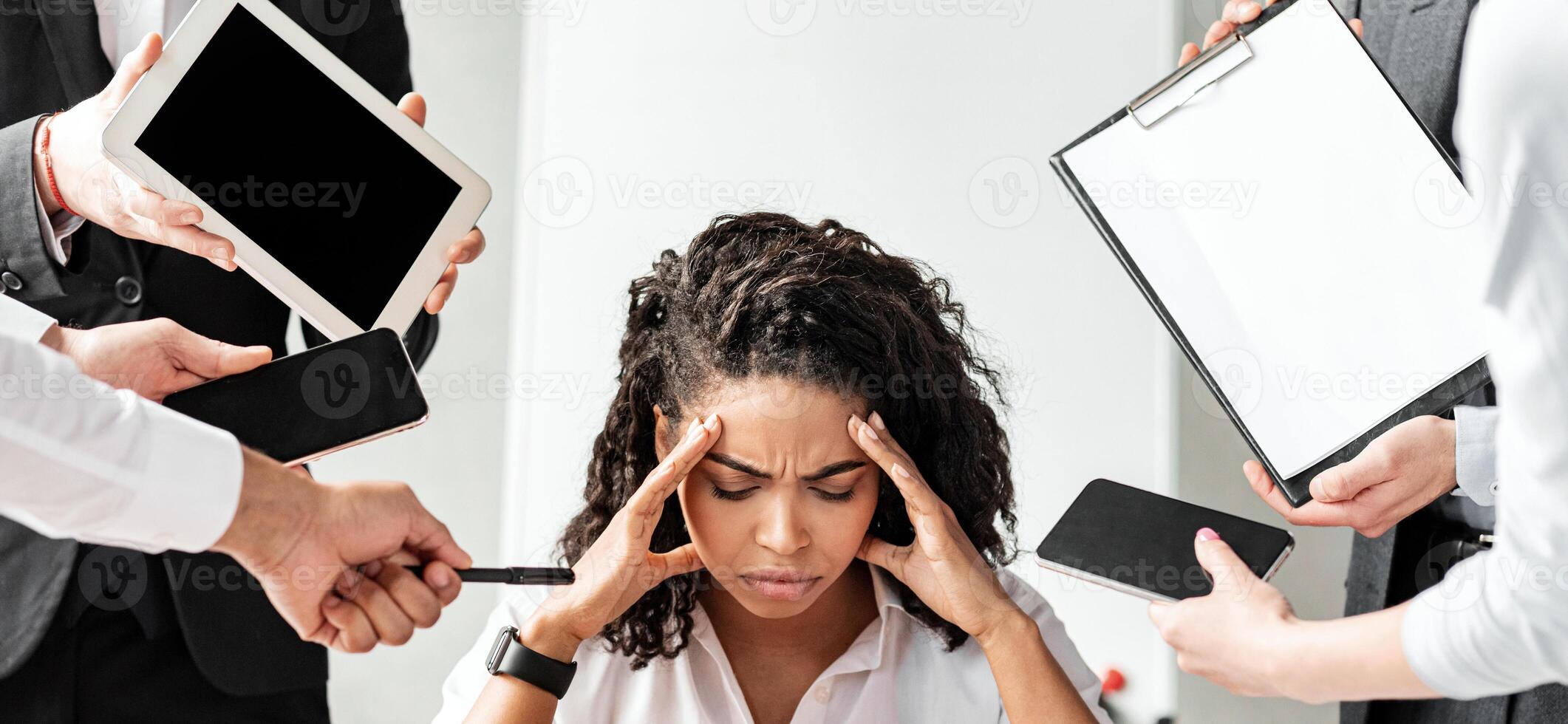Multitasking And Overworking. Stressed Businesswoman At Laptop Touching Head Tired Of Work Tasks Sitting In Modern Office. photo