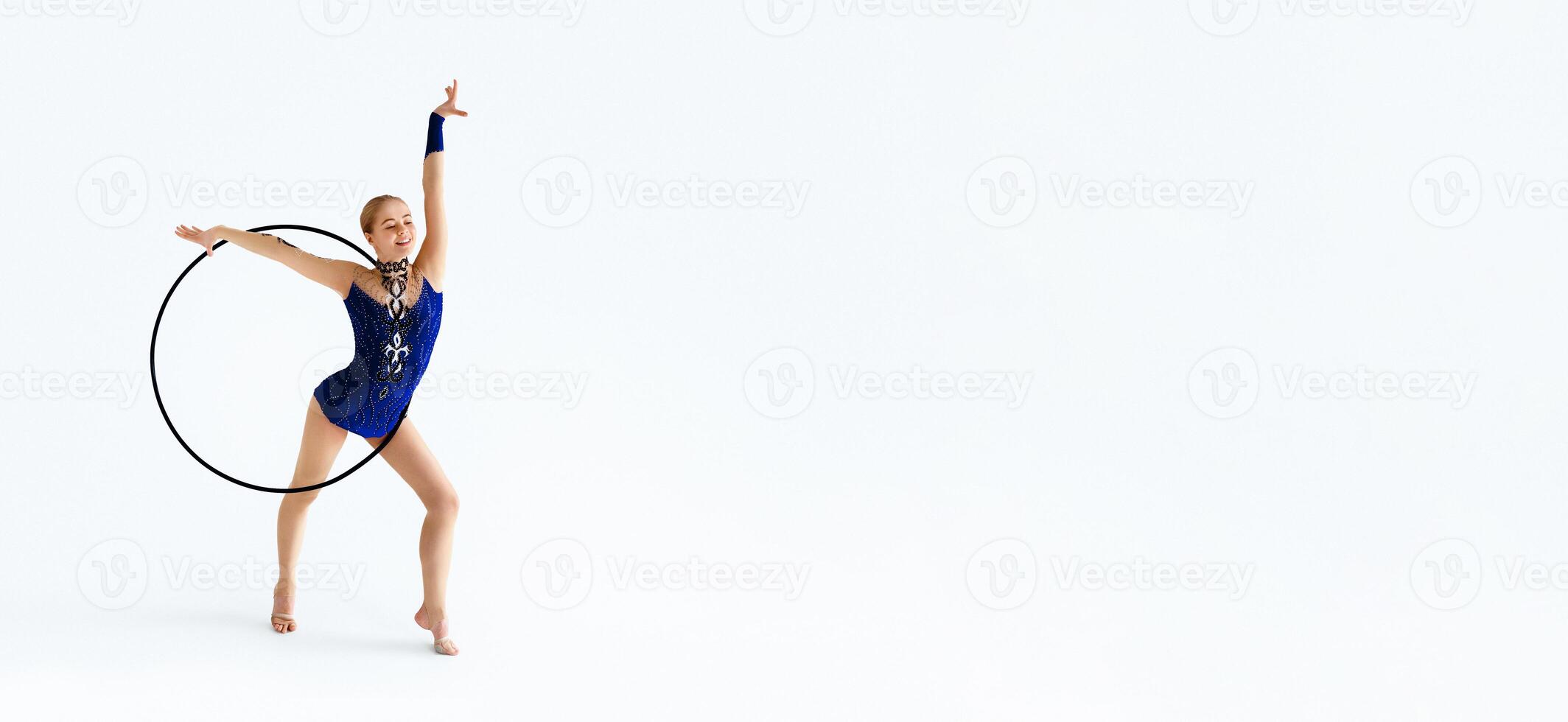 Millennial gymnast getting ready for competition on white background photo