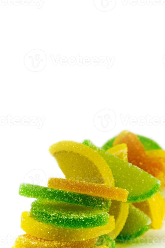 fruit candies on white photo