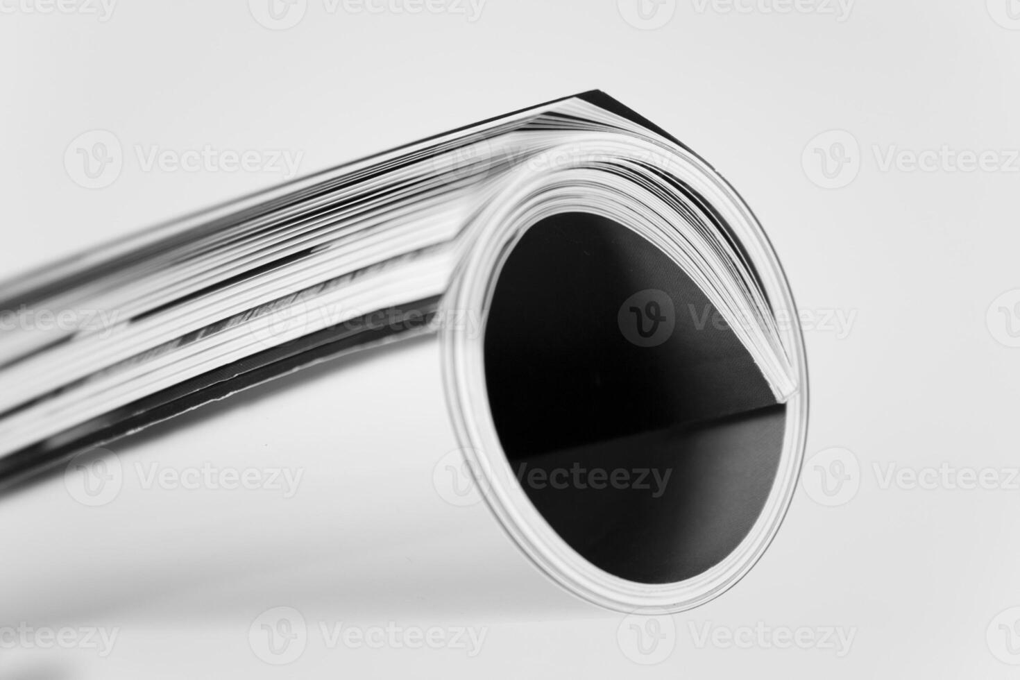 rolled up magazine photo