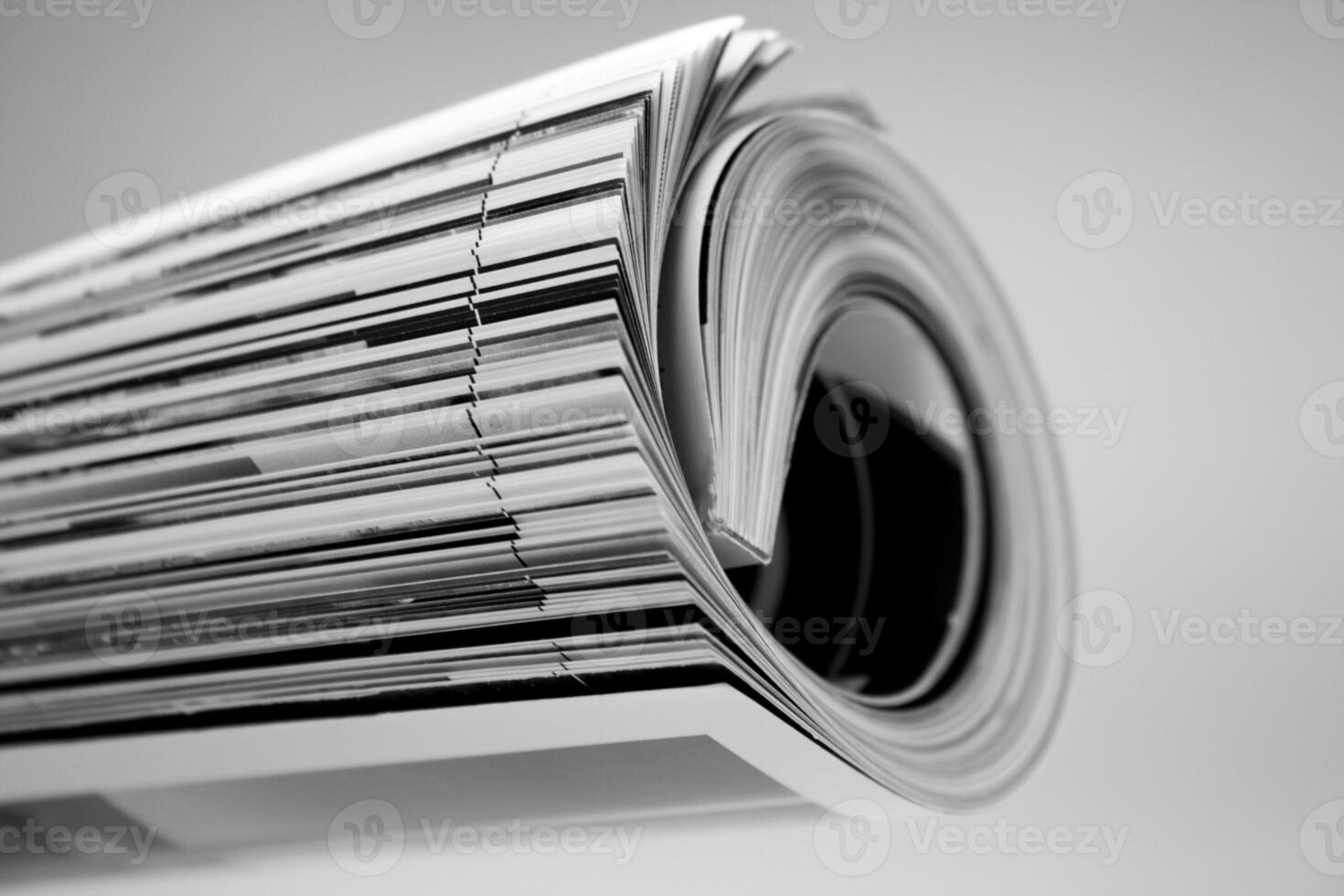 rolled up magazine photo