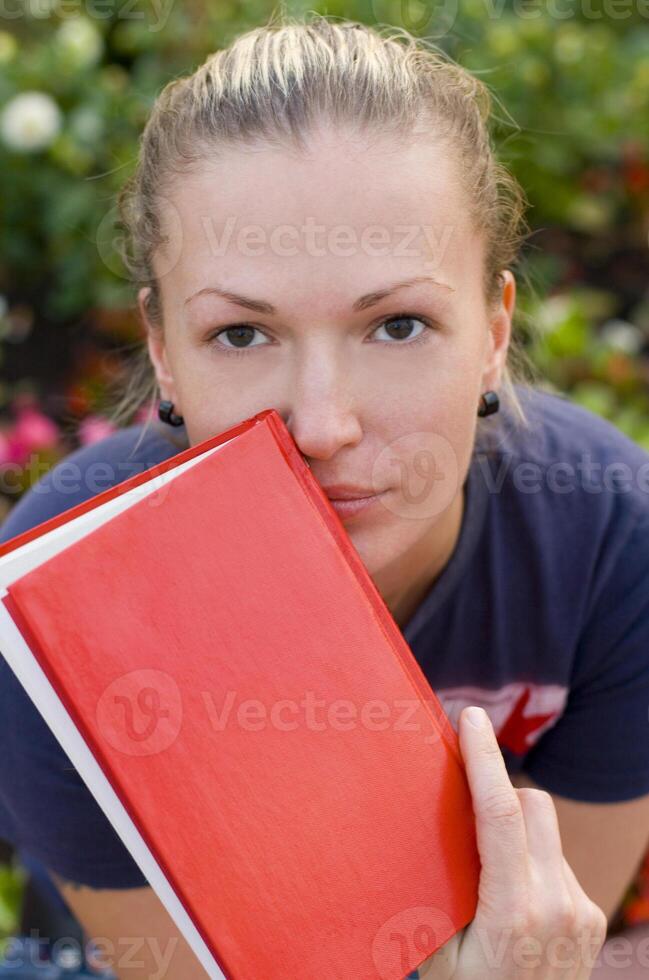 woman with red book photo