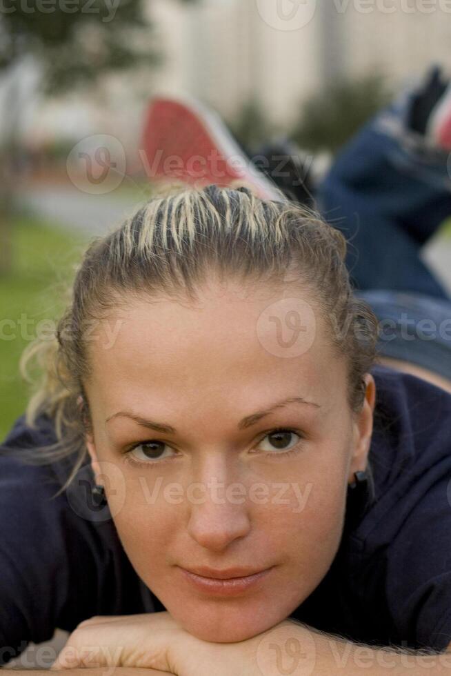woman relaxing in the park photo