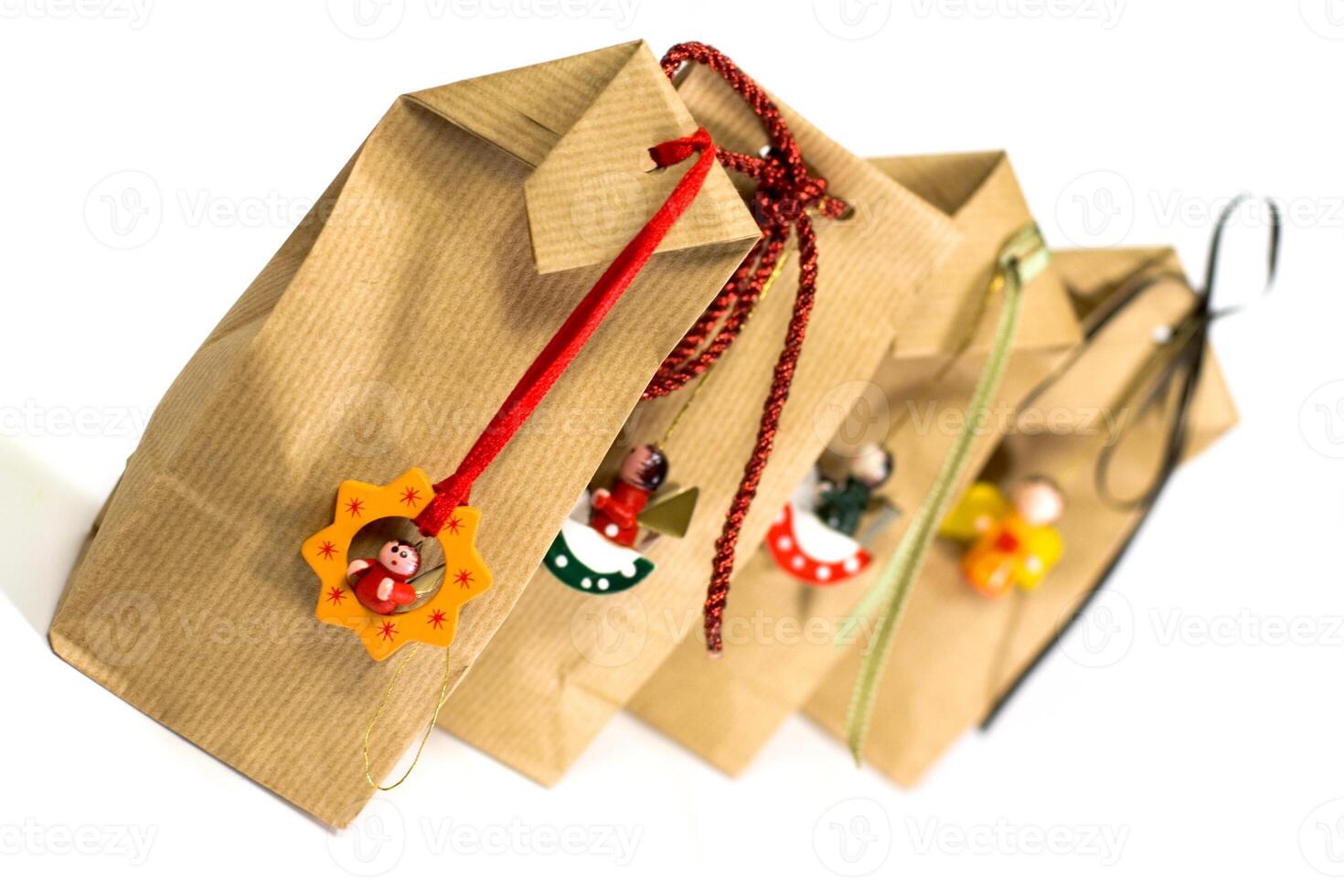 four brown gift bags photo