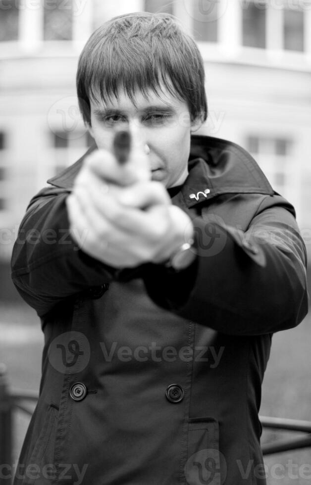 man with gun photo