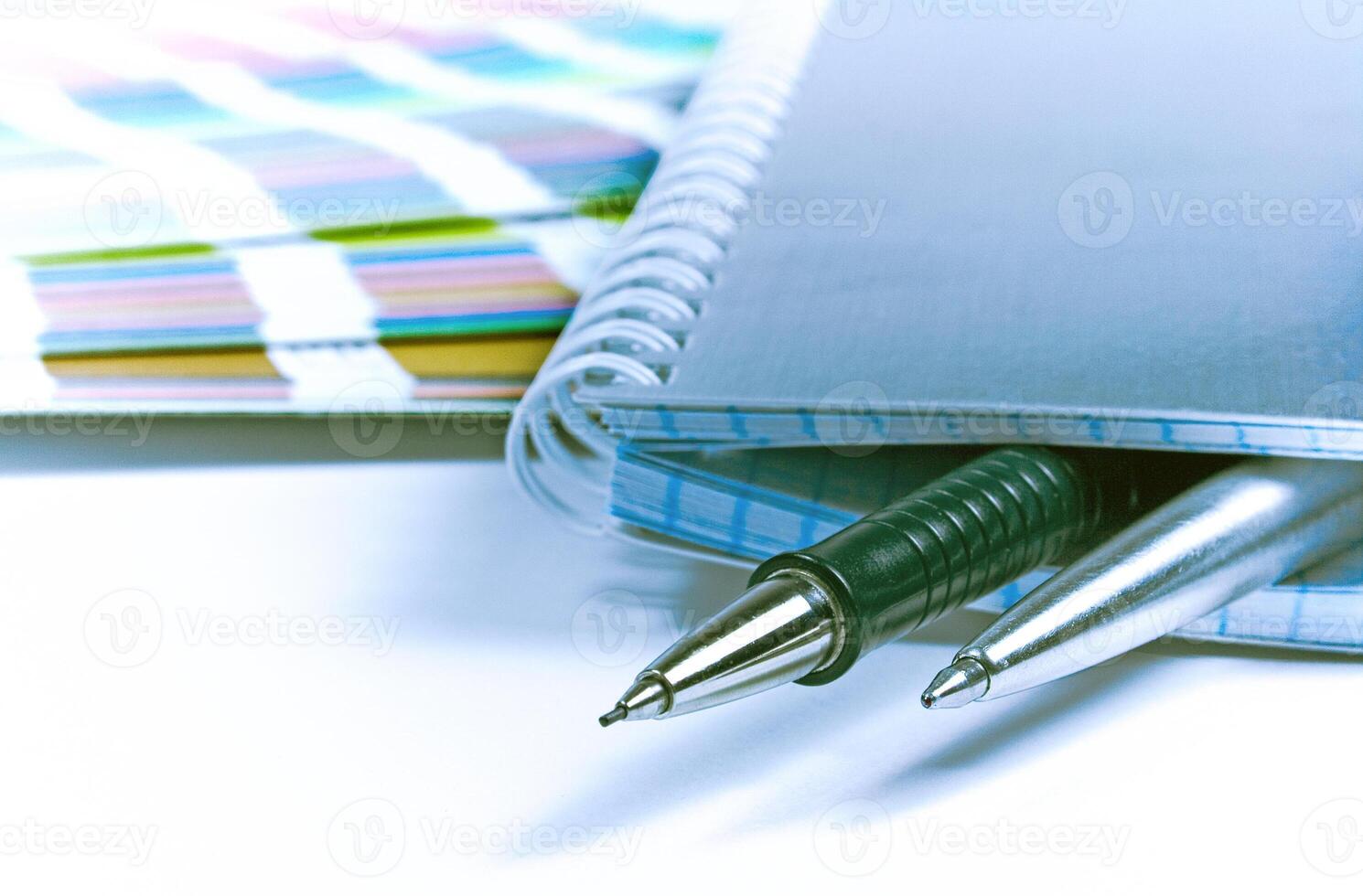 notebook, pens, color guide photo