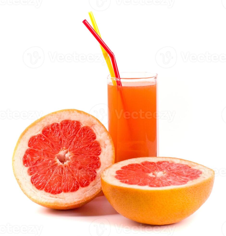 grapefruit and juice in glass photo