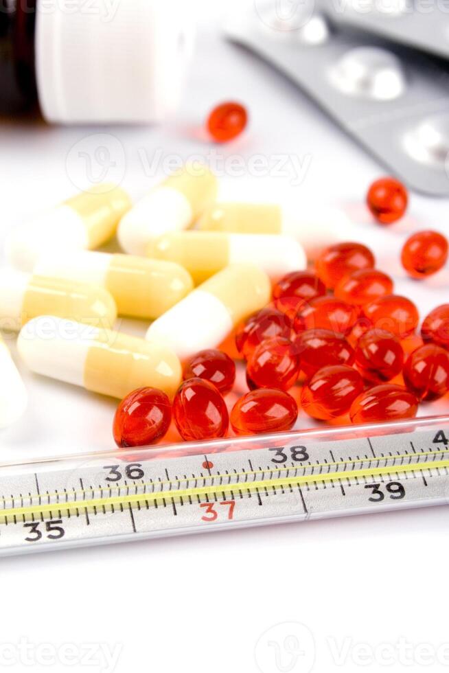 thermometer and pills photo
